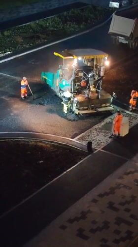 Night road construction operations across Yekaterinburg sites