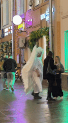 Street musicians perform in decorated Moscow district evening scene