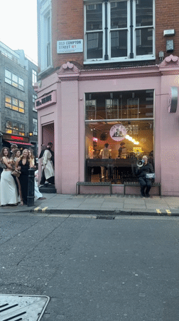 Man demonstrates with megaphone outside London juice shop