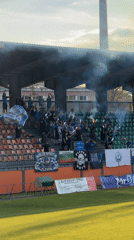 Soccer match held in Lovech stadium with irrigation active