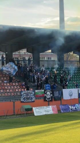 Soccer match held in Lovech stadium with irrigation active