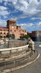 Tourist in kimono visits Republic Square fountain in Yerevan