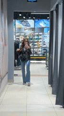 Woman tries on clothes at Kryvyi Rih store