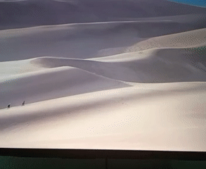 Sand dunes and snowy rock formations in a Moldova desert landscape