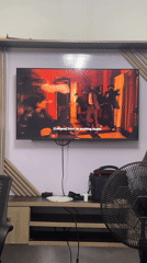 Abuja resident documents TV viewing and city views