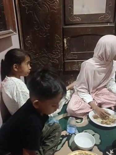 Casual floor meal shared among a small group