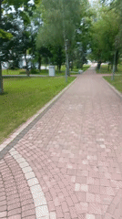 Park paths and bumper cars on a summer afternoon in Minsk