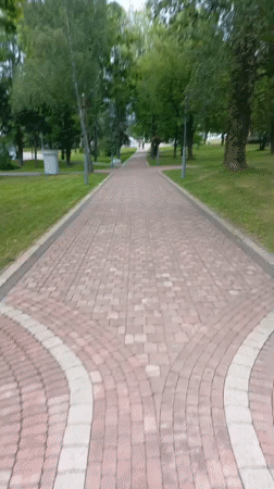 Park paths and bumper cars on a summer afternoon in Minsk