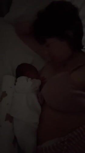 Mother and baby share intimate moment in Aprilia bedroom