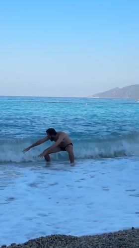Quiet summer morning on a pebble beach in Fethiye