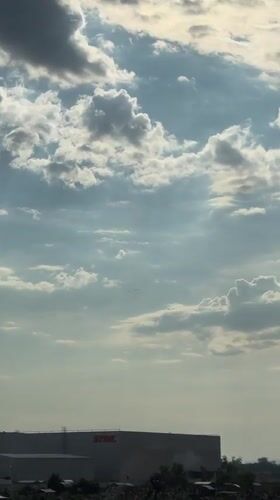 Paratroopers drop from aircraft over Krasnodar, Russia