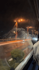 Bridge crossing in Nha Trang features colorful holiday lighting display