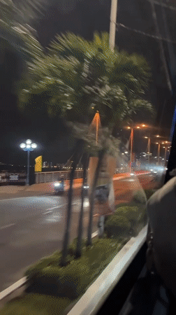 Bridge crossing in Nha Trang features colorful holiday lighting display
