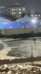 Foam-covered water filmed at Dhaka industrial facility