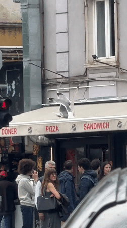 Morning street activity recorded near food shop in Varna