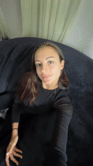 Woman relaxing at home in Chalong, Thailand morning hours