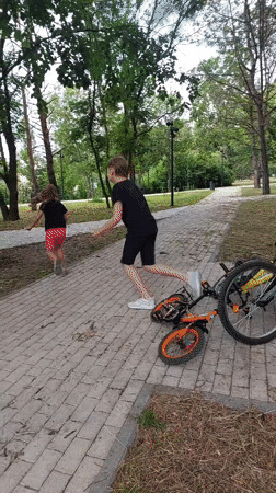 Kids biking and hanging out at a Lermontov park