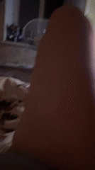 Dimly lit bedroom scene, TV on, close-up angles