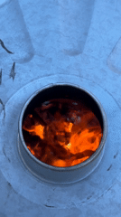 Flames captured burning in metal cylinder in Stamford