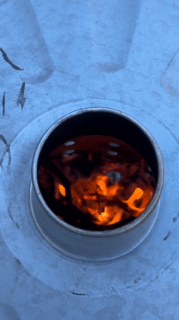 Flames captured burning in metal cylinder in Stamford