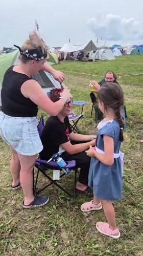 Lazy summer festival morning: guitar, grilled kebabs, and campsite life