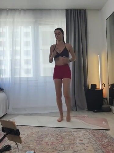 Home yoga and cardio workout on a mat in Tyumen