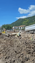 Ordinary daytime scenes: construction work and road traffic observed