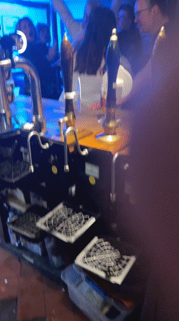Pub patrons dance on bar counter in Boxford evening