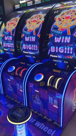 Families enjoy afternoon arcade gaming session in Kudrovo, Russia