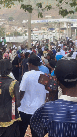Large crowd gathers at Lokoja gas station