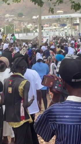 Large crowd gathers at Lokoja gas station