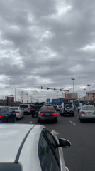 Rollerblader weaves through gridlocked traffic in Ilado, Nigeria