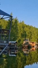 Woman photographed at multiple riverside locations in Chaikovsky, Russia