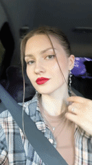 Woman takes selfies in car and outdoors in Saint Petersburg