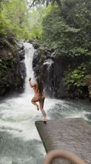 Morning waterfall jumping activities documented in Sukasada, Indonesia