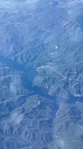 Aerial footage captures mountainous landscape over Carsoli, Italy