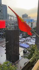 Vietnamese flag displays and lantern decorations observed in Thủ Đức