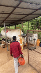 Customer refills gas cylinder at Abuja filling station