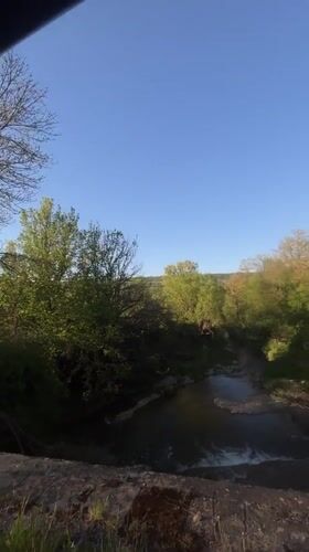 Vehicle captures river view in wooded Veselinovo area