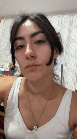 Woman enjoys late-night cake in Puebla, Mexico