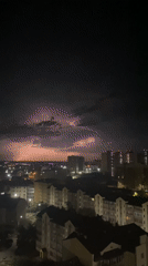 Irkutsk at night, apartment blocks glowing from above