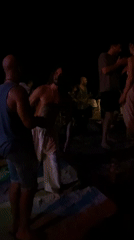Nighttime beach party documented in Koh Phangan, Thailand