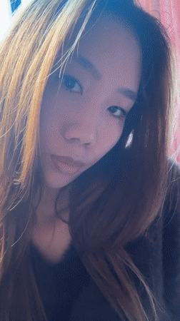 Woman takes multiple selfies in Hechuan, China morning session