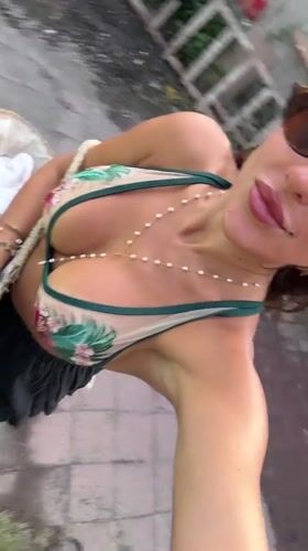 Woman Films Selfies in Kuta Selatan Early Morning Hours