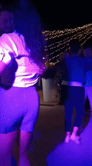 Evening dance party under string lights in Roseto degli Abruzzi