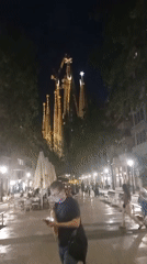 Nighttime scenes of illuminated Sagrada Familia captured by witnesses