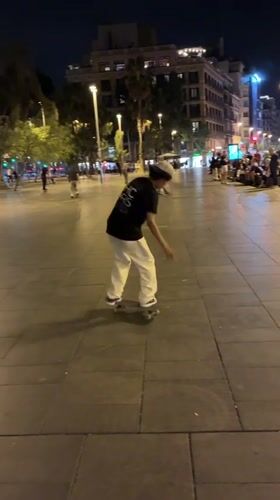 Evening street life documented across Barcelona plazas and sidewalks
