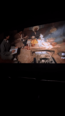 Movie screening and car display captured in Shapingba District