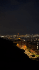 Barcelona cityscape captured in nighttime views from elevated positions