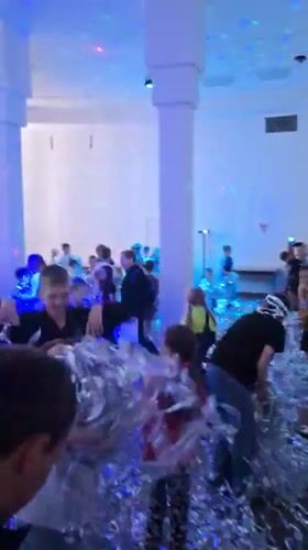 Silver-themed kids' party with disco balls and foil in Russia